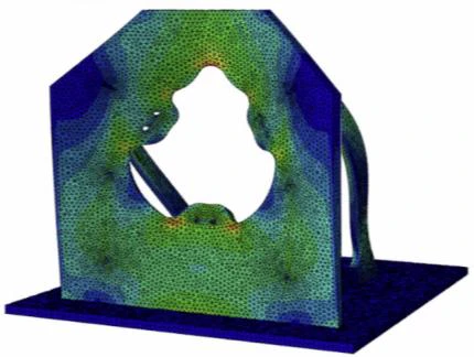 Finite element analysis of the aluminium L-bracket engine mount under 5 kN of nominal thrust, meshed and colour-mapped, deformation scaled 85 times
