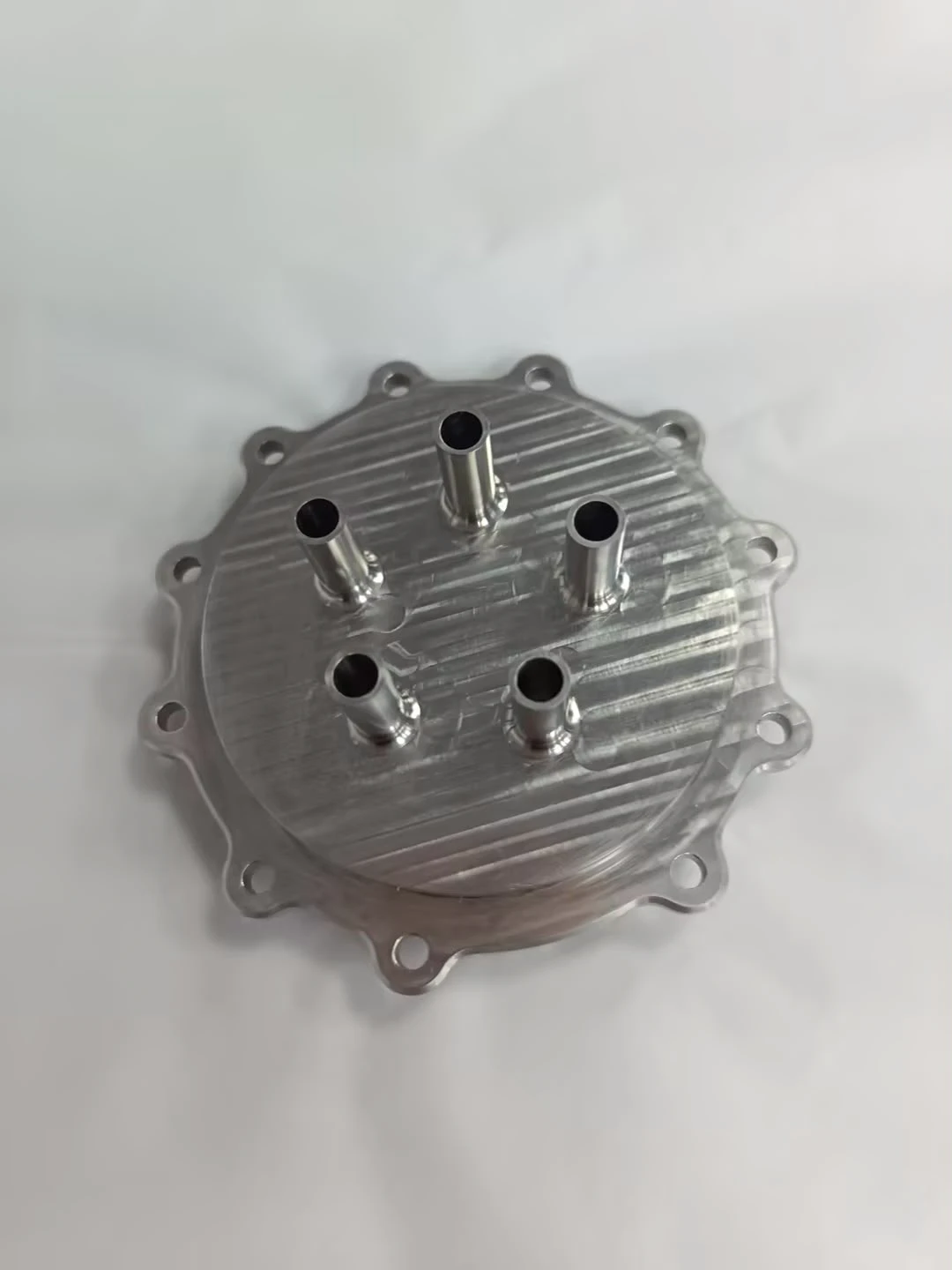 Plate with five inner oxidiser swirler posts protruding from its face