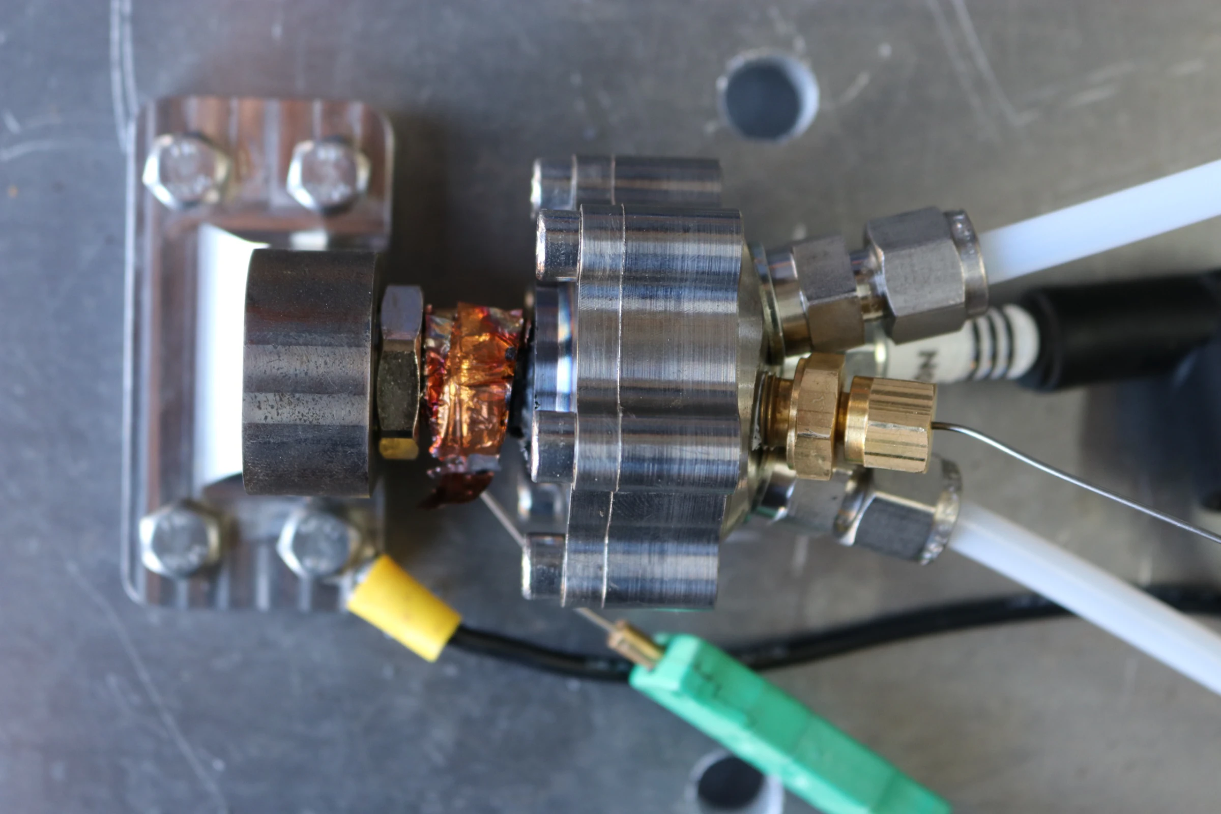 Top view of the mounted igniter between firings, the joint darkened with scorch.