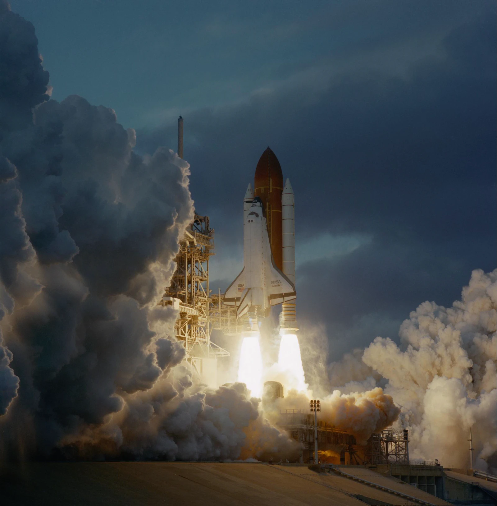 Space Shuttle Atlantis lifting off Pad 39A at Kennedy Space Center on a column of exhaust, 12 November 1995